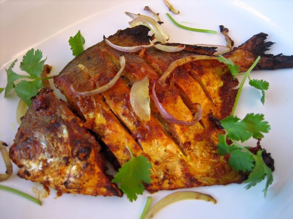 Masala pomfret fry with onion and coriander