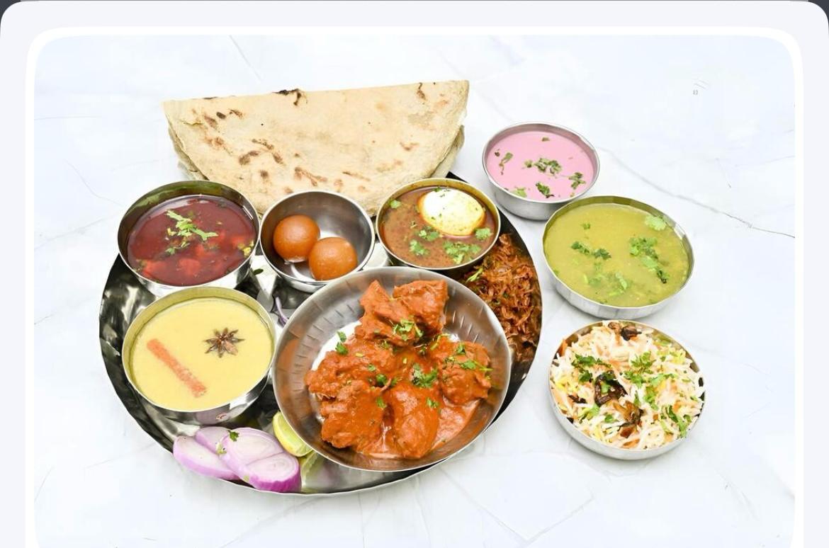 Non-veg thali spread with sol kadhi and rice