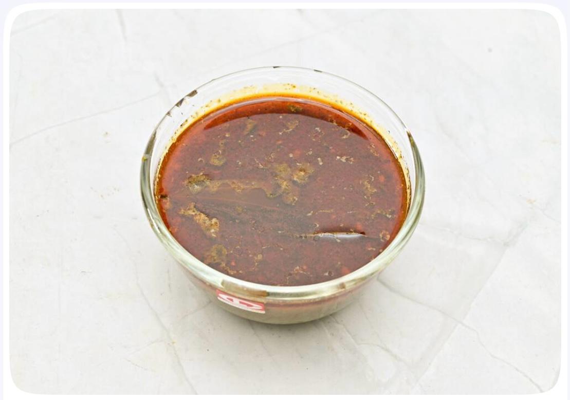 Kala masala rassa simmered with whole spices