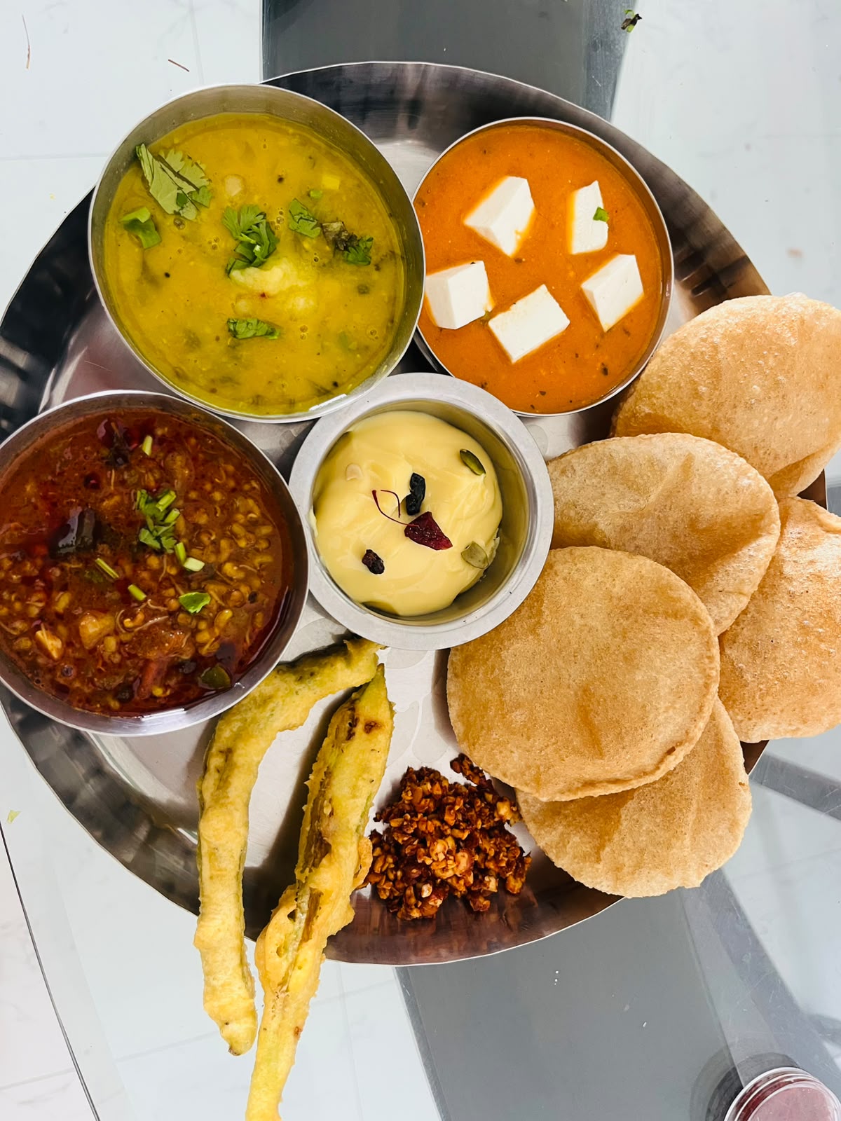 Vegetarian thali with puris