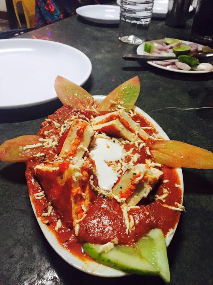 Paneer in rich red gravy with cream